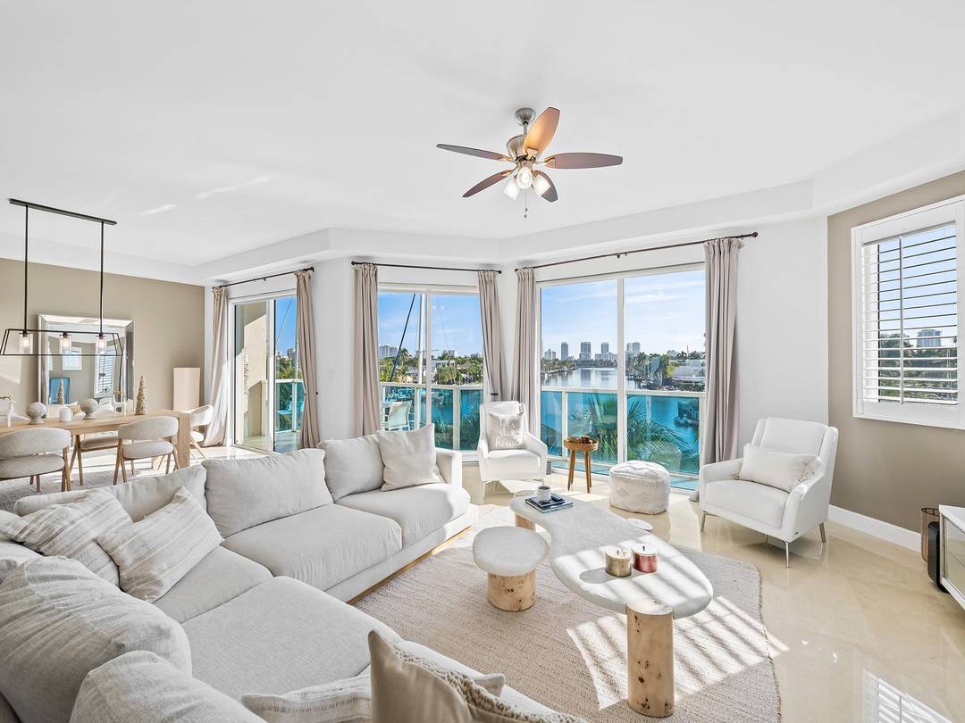 Spectacular corner residence with panoramic water views of the Rio Barcelona and the Intracoastal.