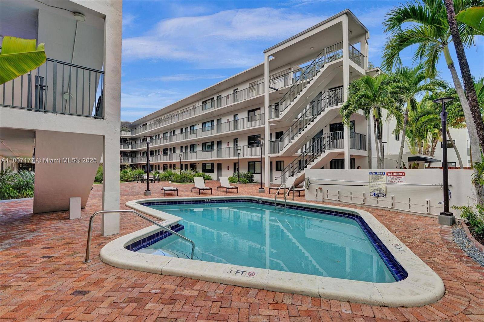 This stunning 2 bedroom historic penthouse in Coconut Grove's iconic 4 story building boasts unparalleled privacy and a sense of community through it's innovative two wing design.