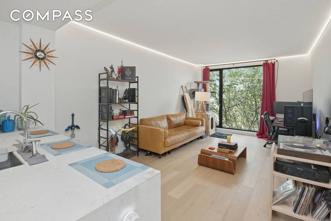 Welcome to modern living at 37 14 34th St in vibrant Queens, NY !