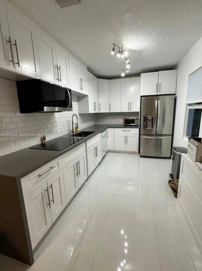 CASH COW OPPORTUNITY Income producing property currently configured as three 2 bed 1 bath 1 rental RV unit generating 6, 550 PER MONTH TOTAL !