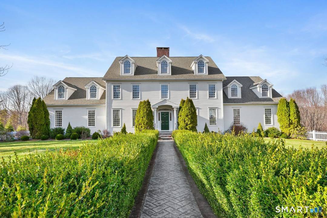 Set at the end of a quiet cul de sac in Easton, this stately Federal style colonial offers a rare combination of timeless architecture, privacy, and pretty views across the ...