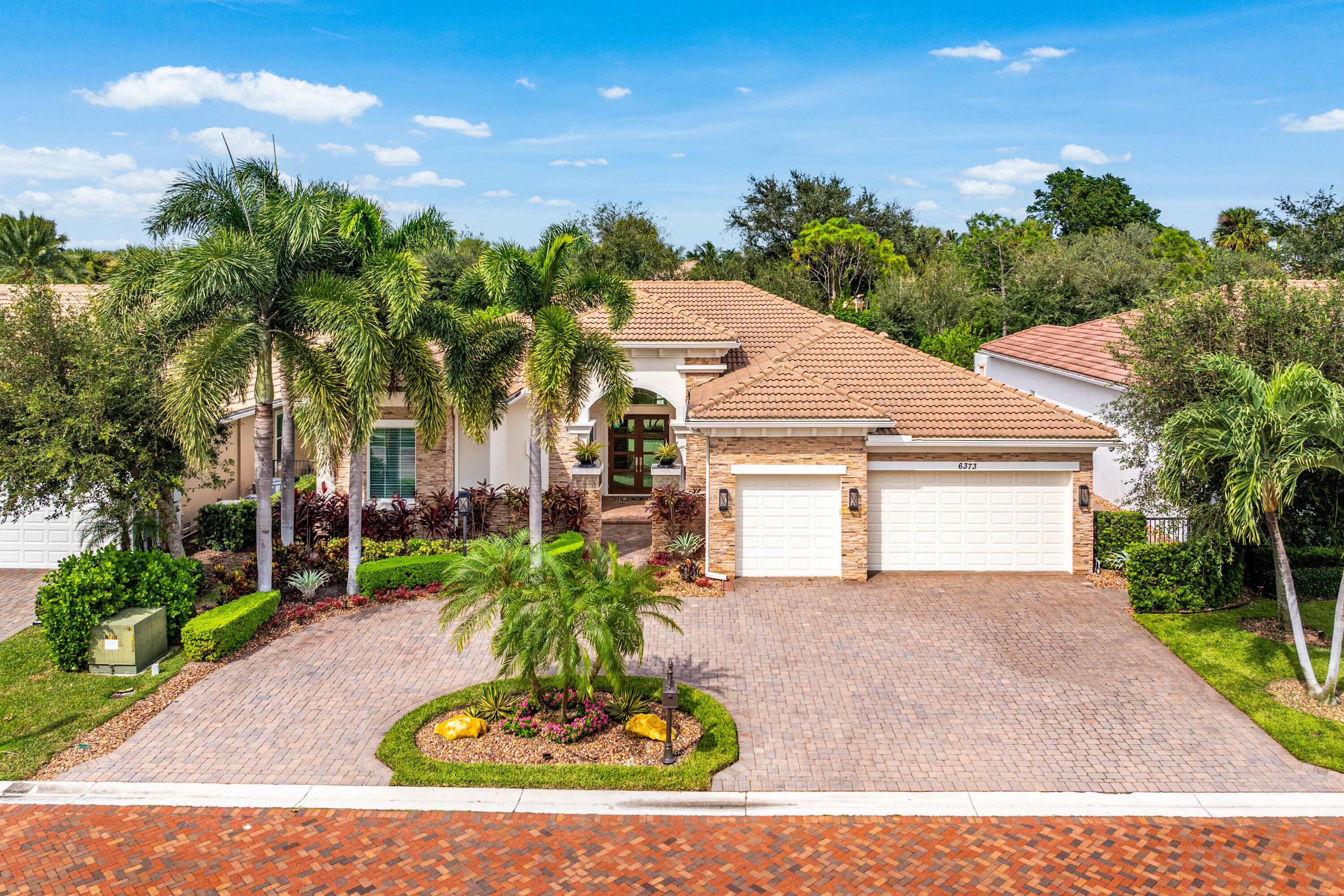 Experience luxury living in this fully renovated 4 bed 3 bath home nestled on a private lot in the Azura community located in Boca Raton.