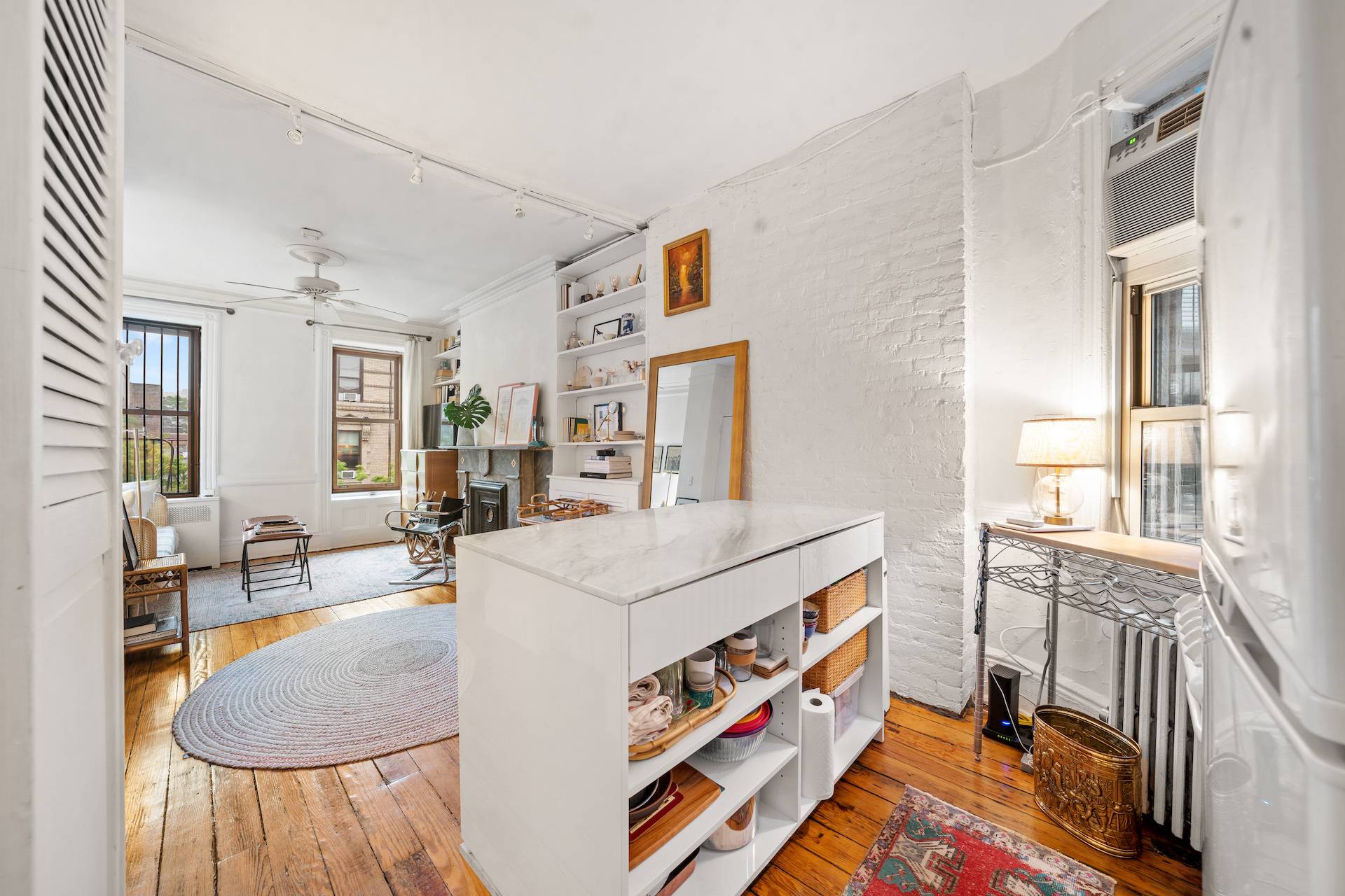 Sun Splashed One Bed The apartment faces the bright, quiet and tree lined west 10th street in the heart of the West Village.