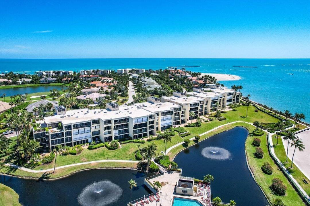 This chic third floor condominium in Sailfish Point offers an exceptional luxury coastal lifestyle.