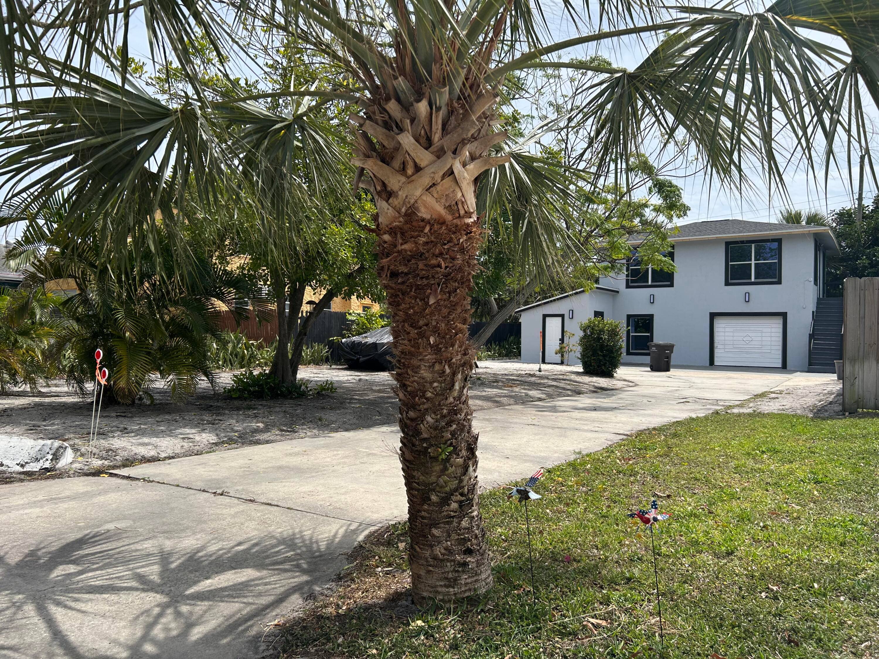 Charming fully renovated duplex that commands simplistic elegance in a prime coastal location with endless potential.