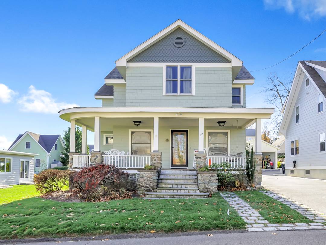 Coastal living at its finest in this beautifully updated 3 4 bedroom, 2 1 2 bath Colonial Craftsman, ideally located just two homes in from the water in the highly ...