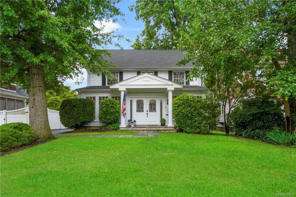 Charming American Colonial style home with delightful living spaces.