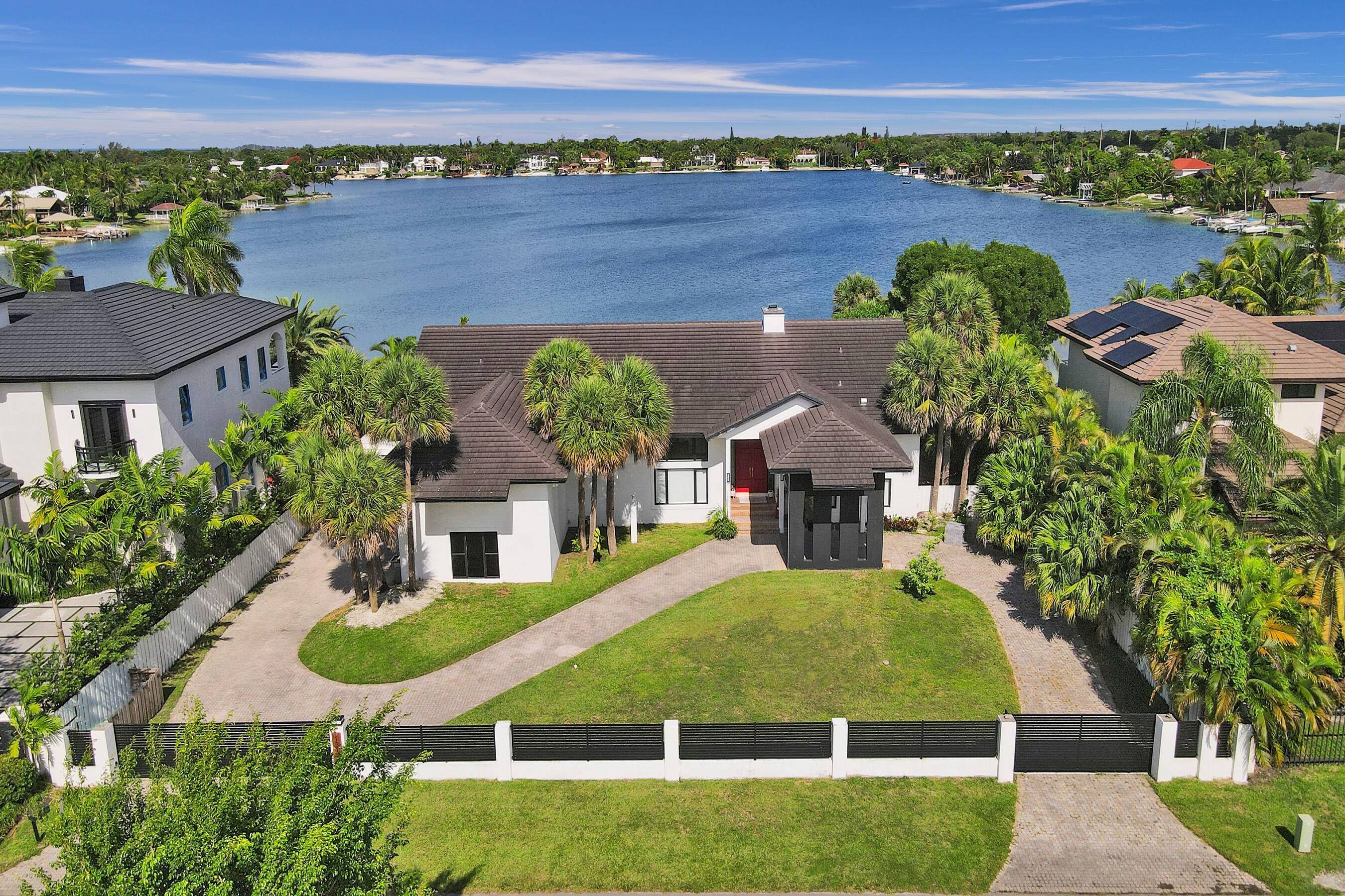 Exclusive E Lake Home. On one of Miami's only operable lakes where everyone owns boats and personal watercraft.