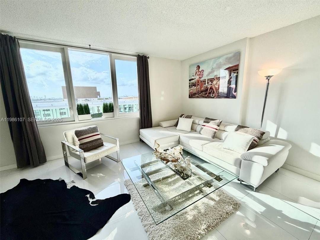 Beautifully updated 9th floor residence offering unobstructed city skyline views and stunning year round sunsets.