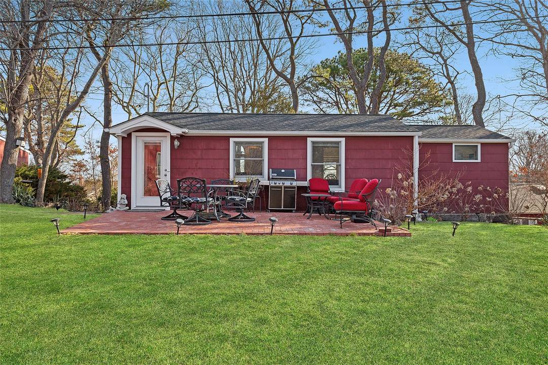 Indulge in the quintessential Hampton lifestyle at this exquisite, secluded waterfront seasonal cottage community overlooking the breathtaking Great Peconic Bay.