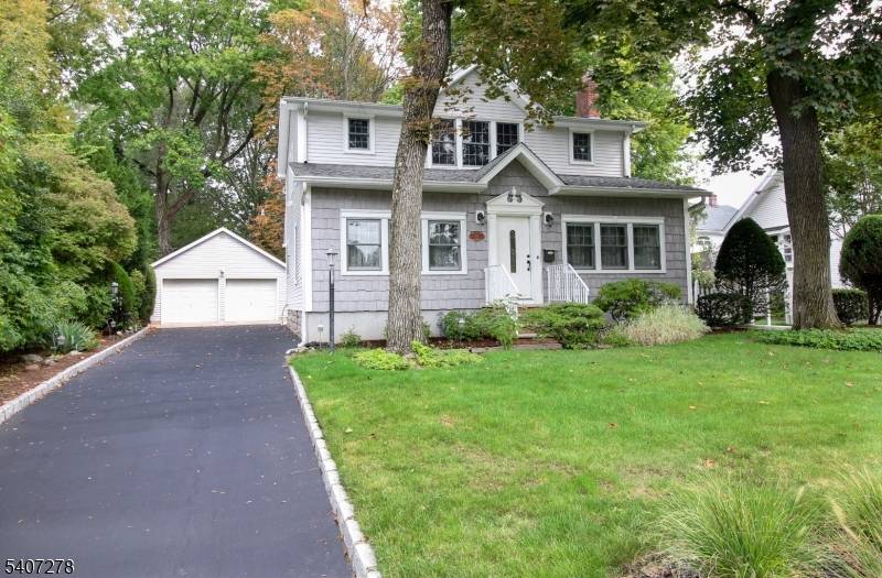 Charming, meticulously maintained Colonial featuring 3 bedrooms and 1.
