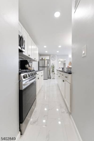 Wake up every morning to beautiful sunrise views from this fully renovated 5th floor condo, complete with a spacious balcony that extends your living space outdoors.