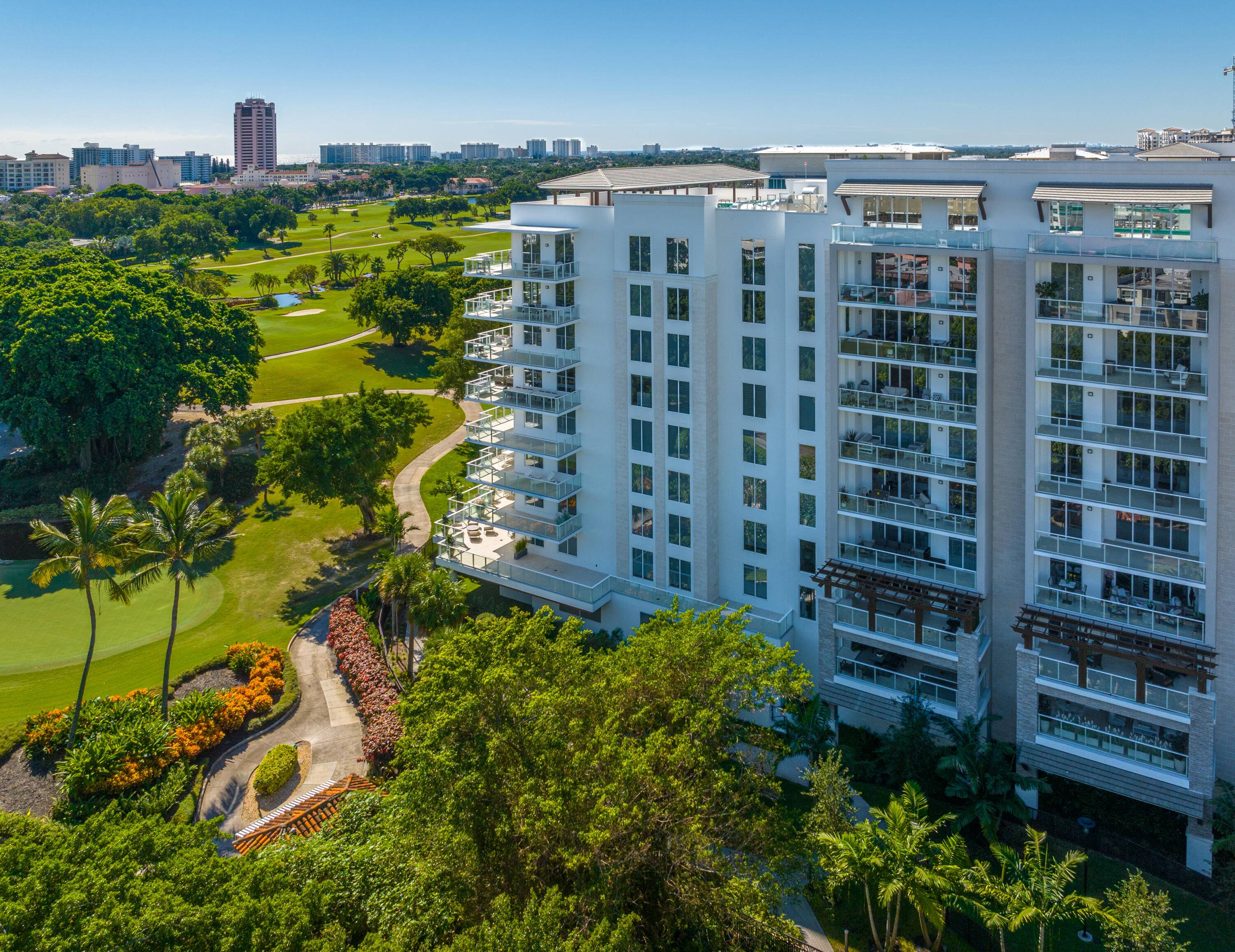 Alina Residences premier NE facing condominium with private elevator foyer and deeded parking spot.