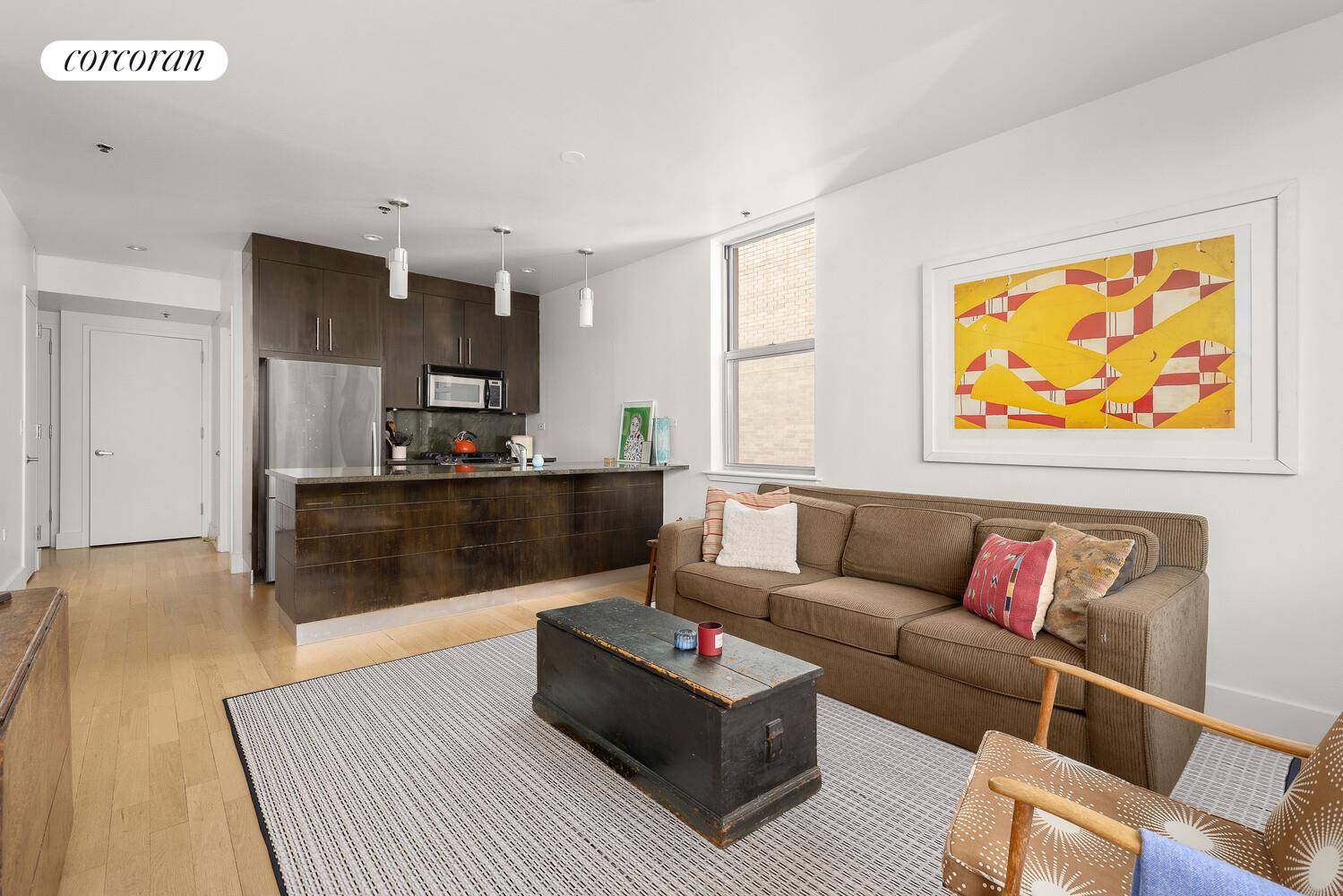 Welcome to 154 Attorney Street 603, a bright and modern 2 bedroom condo with a private balcony in the vibrant Lower East Side.