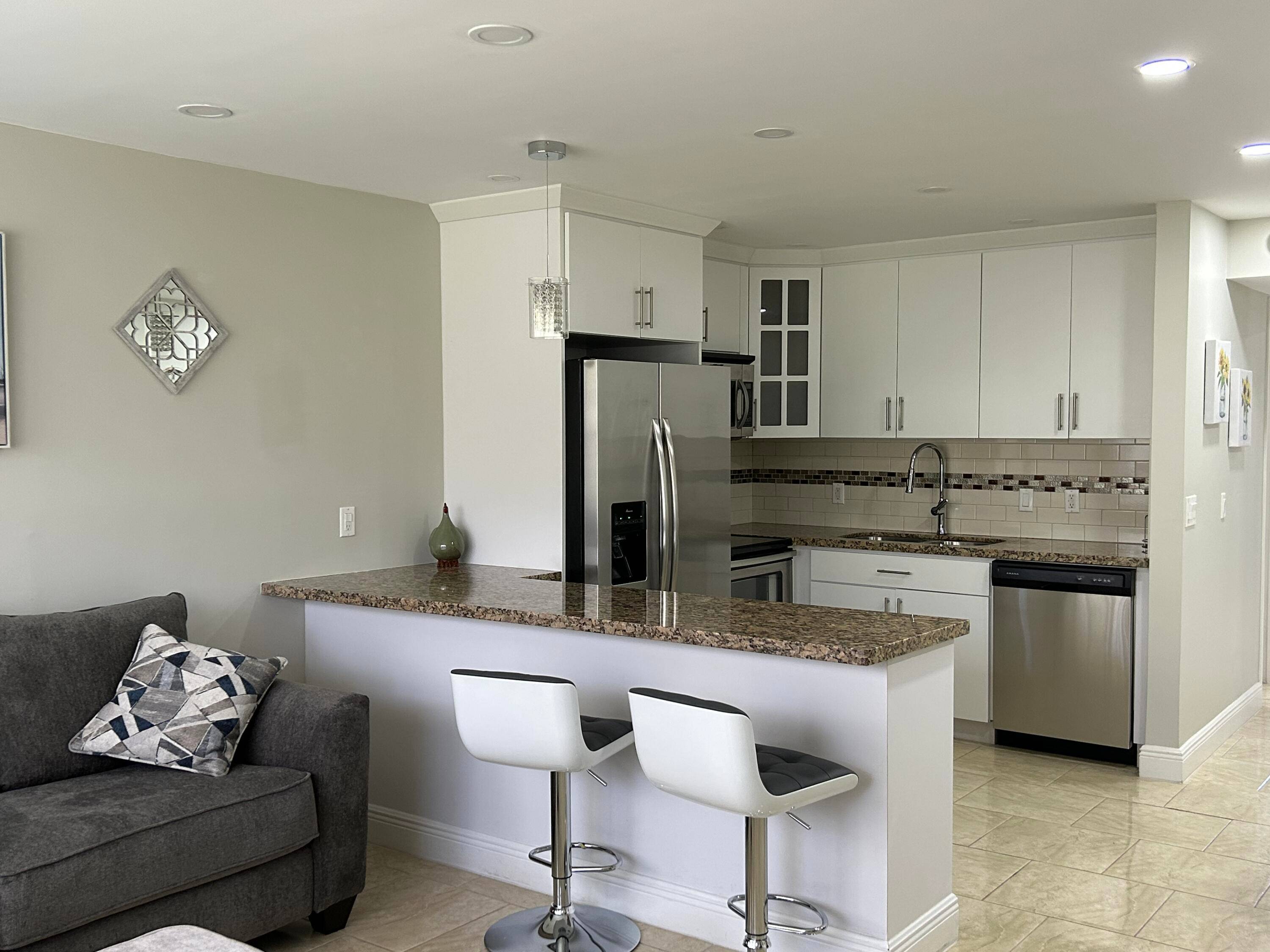 FULLY FURNISHED, TURNKEY, beautifully updated 1 bedroom 1 bath conveniently located on the FIRST floor.