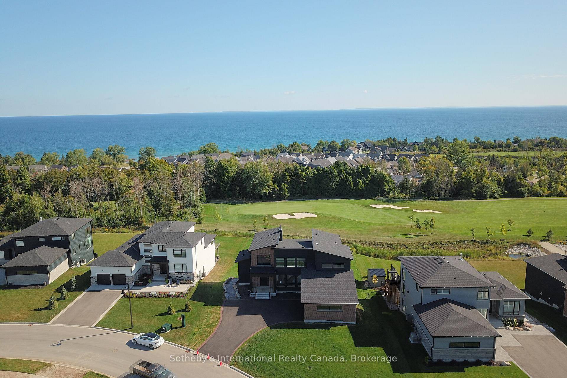 Welcome to 101 Sladden Court, an exquisite home nestled on one of Lora Bay's most coveted lots, offering breathtaking views of the 13th hole, Georgian Bay, and the Niagara Escarpment.