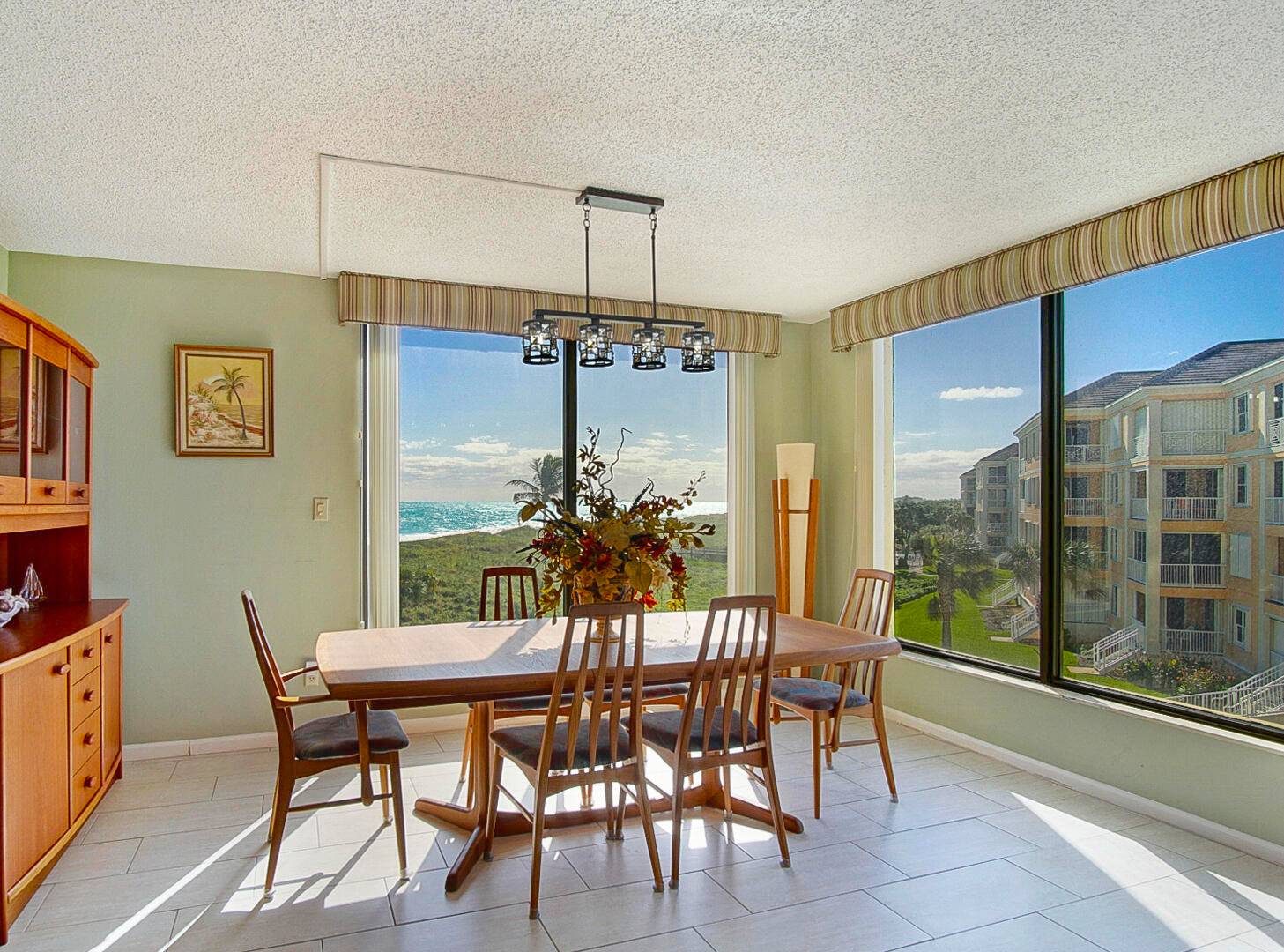 Absolutely stunning 4th floor, TURNKEY ocean view condo, 2 bed 2 bath, features 100 impact glass, beautifully remodeled kitchen and both baths, teakwood furniture, newer HWH and AC, new appliances ...