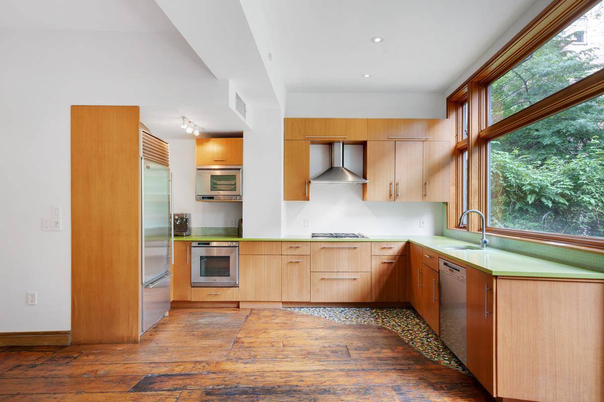 Perfect Live work 244 West 12th Street is a beautiful red brick townhouse located on a tree lined, cobblestone street on one of the best blocks in the heart of ...