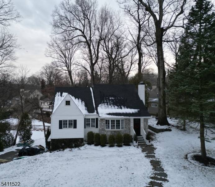 HONEY STOP THE CAR ! This well maintained custom Cape Cod, lake style home could be your new all year retreat.