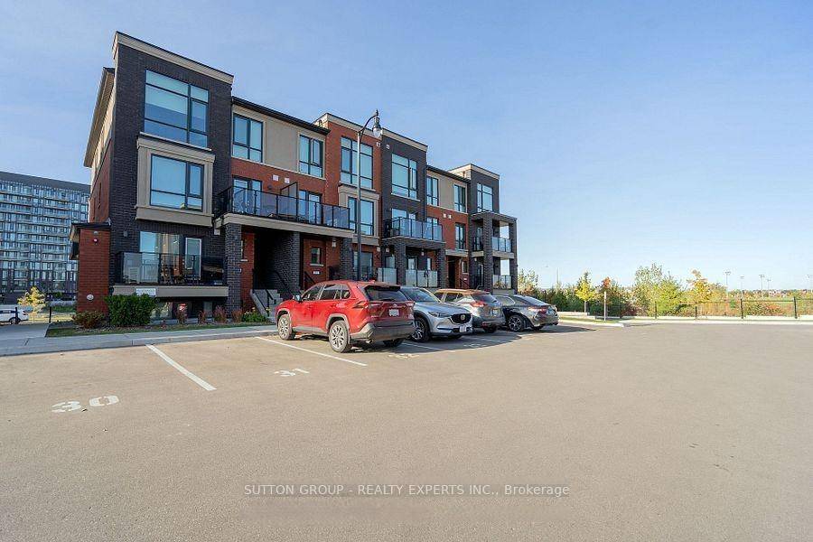 ASSIGNMENT SALE This immaculate, stacked townhouse features two spacious bedrooms and two bathrooms, open concept kitchen, offering both style and functionality.