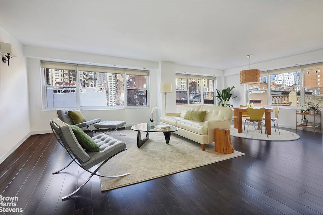 Apt. 6E at 150 East 61st Street is an expansive and beautifully renovated two bedroom, two bathroom corner residence with an enormous open living and dining area in the heart ...