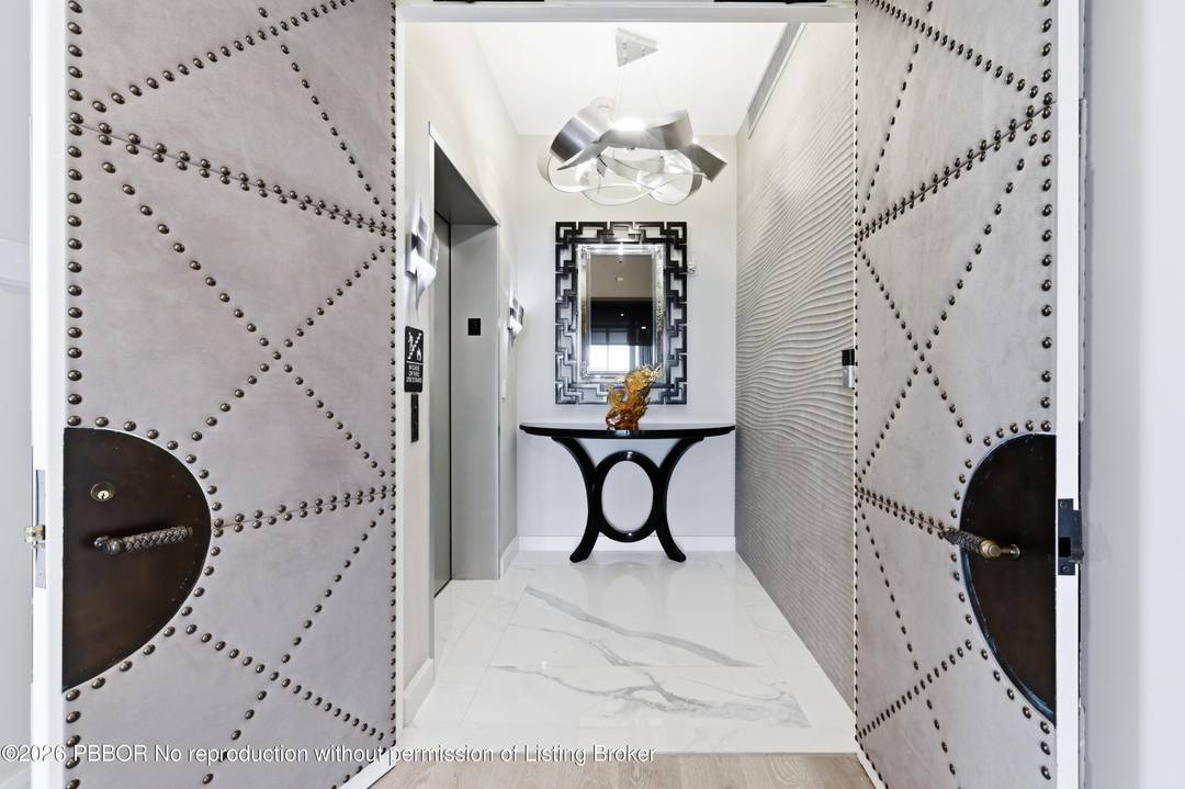 Prestigious Il Lugano, Palm Beach's premier direct lakefront building, featuring only 13 spectacular rarely available units.