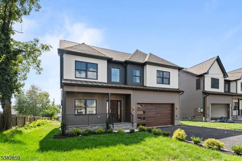 Step into the luxury of Prawdzik Properties with this brand new, beautifully designed home featuring 5 spacious bedrooms and 3.