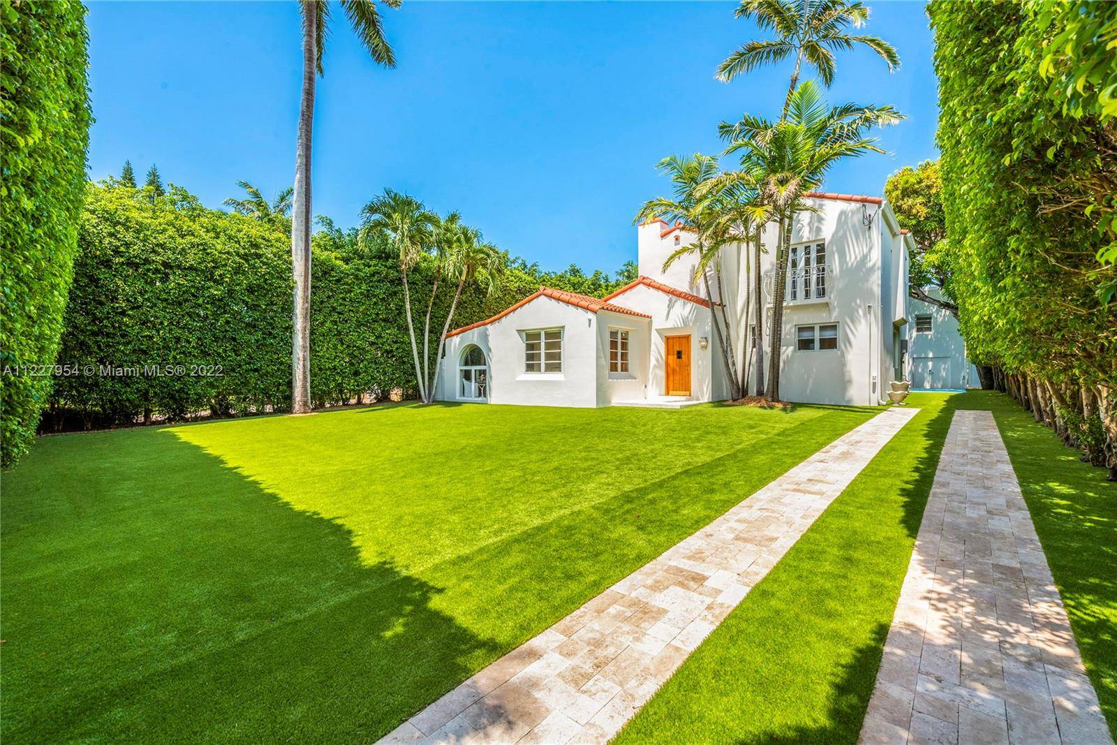 Stunning Mediterranean remodel steps away from the Miami Beach Country Club.