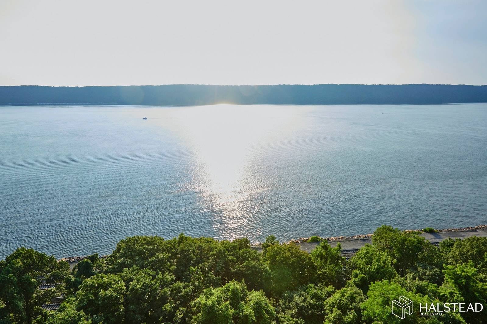 RIVERFRONT LUXURY ! A corner apartment with spectacular views spanning from the George Washington Bridge to the Mario Cuomo Bridge with Hudson River and Palisades Views, birds, ships and spectacular ...