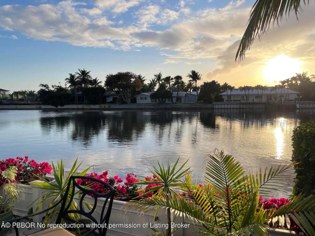Experience ocean to lake living in this rare townhome directly on the Intracoastal, only 1 of 7 offered at the Reef.