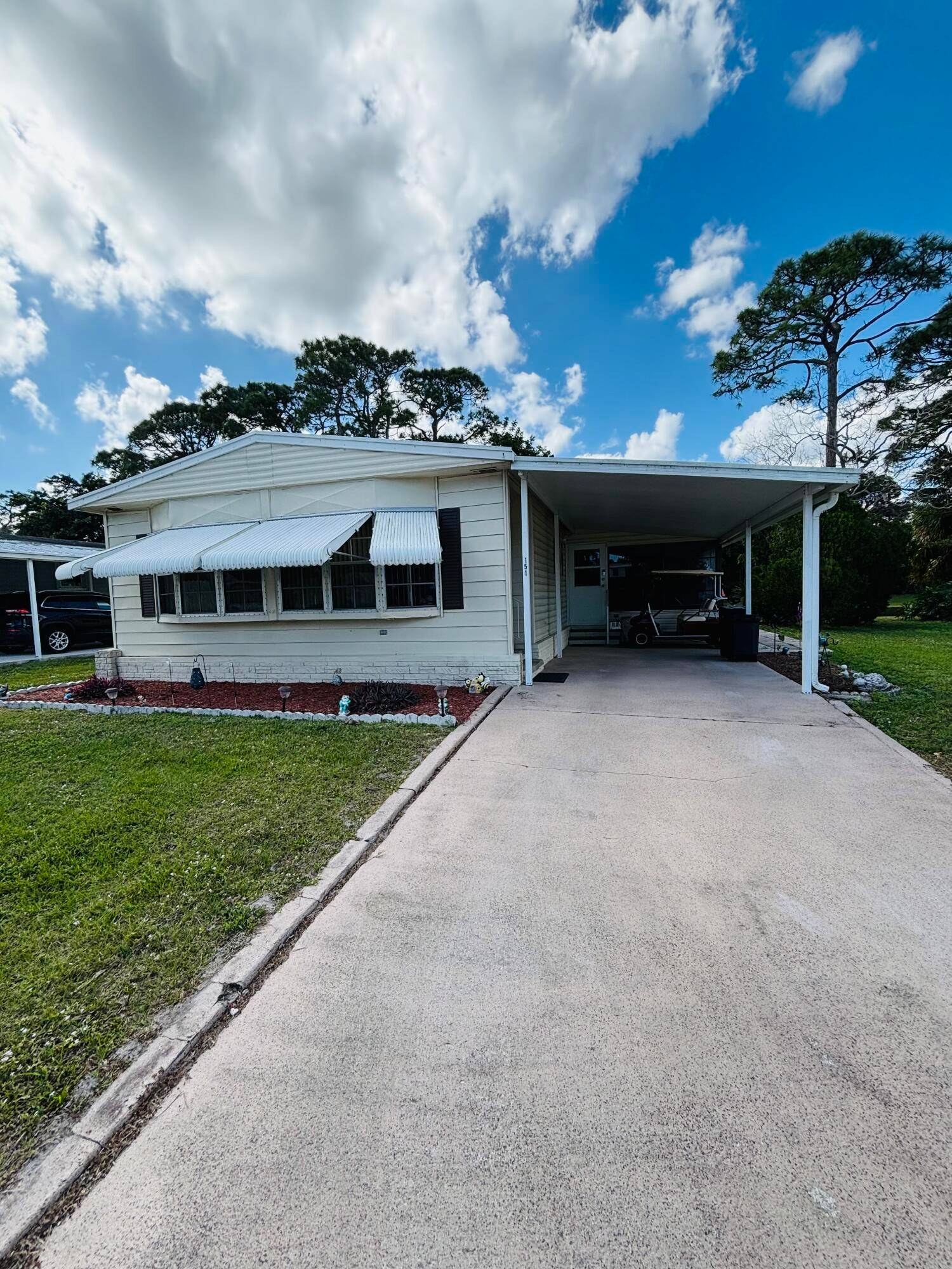 Welcome to one of the best homes for sale in Spanish Lakes Golf Village, an active 55 community in the heart of Port St.