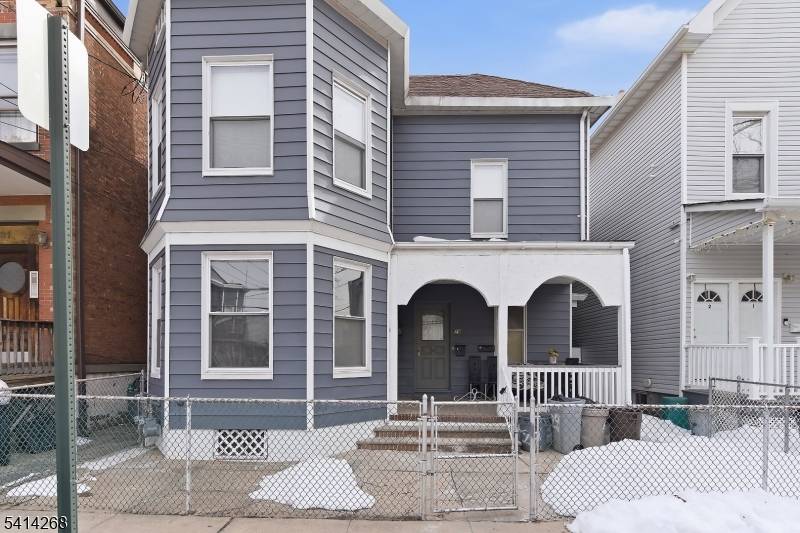 Enormous two family home offering a whopping 3, 917 square feet of living space, incredibly spacious rooms in both units and located near new large scale luxury apartment complexes !