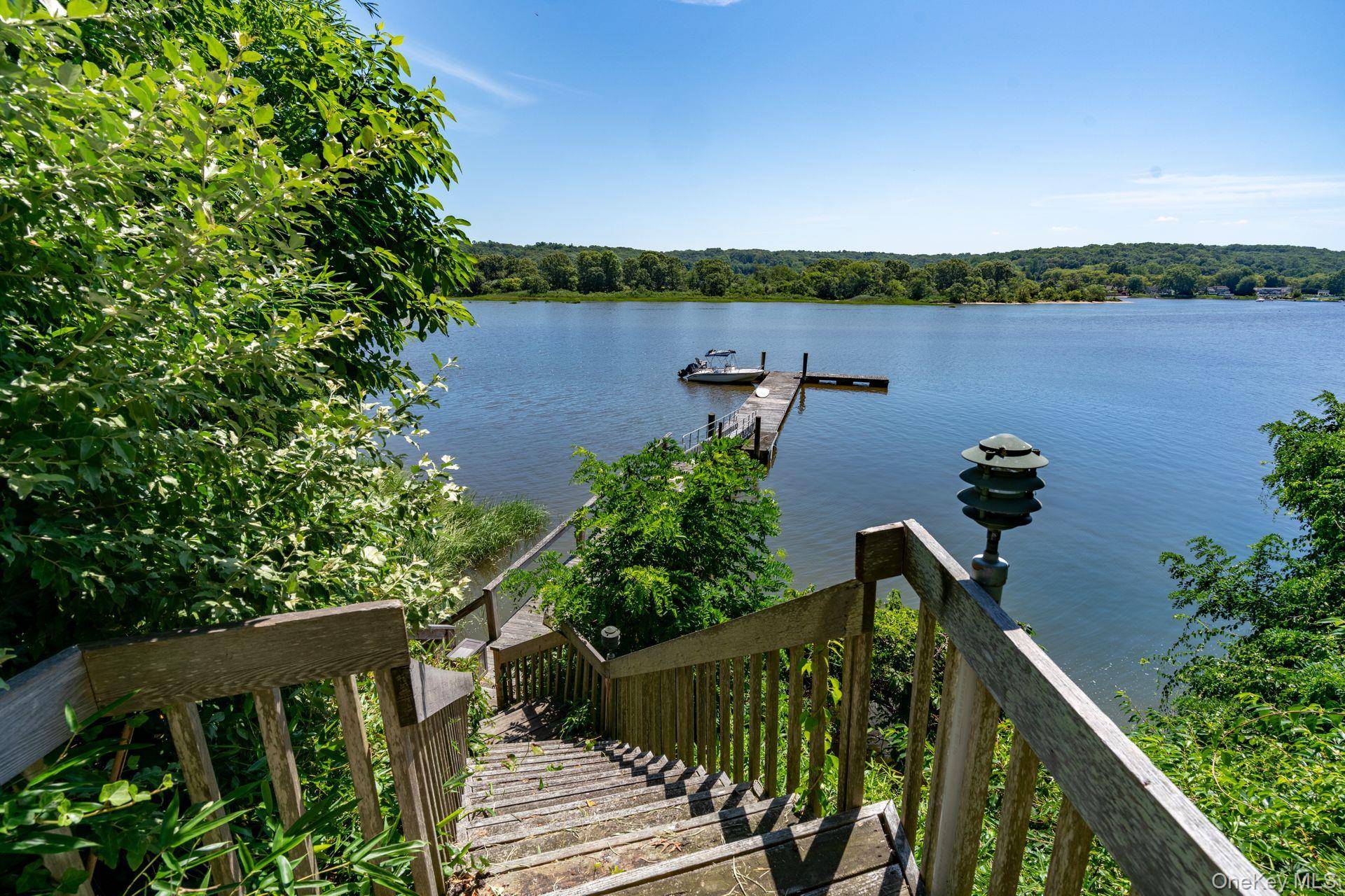 Experience the magic of waterfront living with expansive, unobstructed views of Northport Harbor and the Long Island Sound.