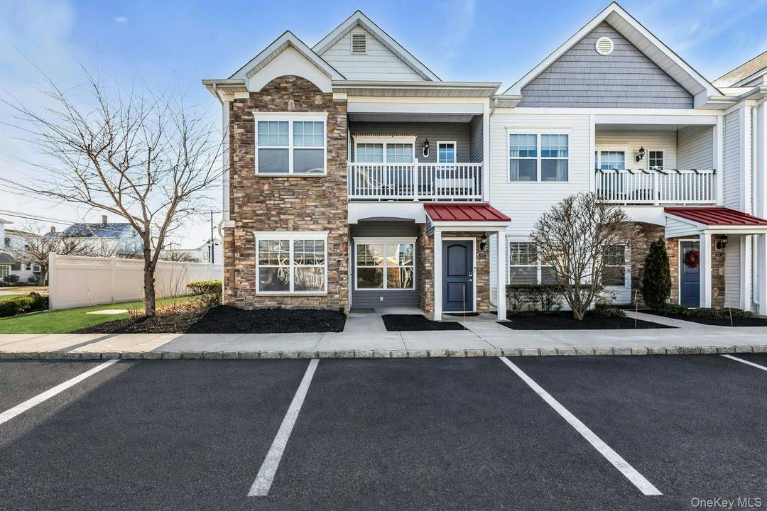 Conveniently located on the ground level, this desirable end unit condo offers easy living in the heart of Patchogue Village.