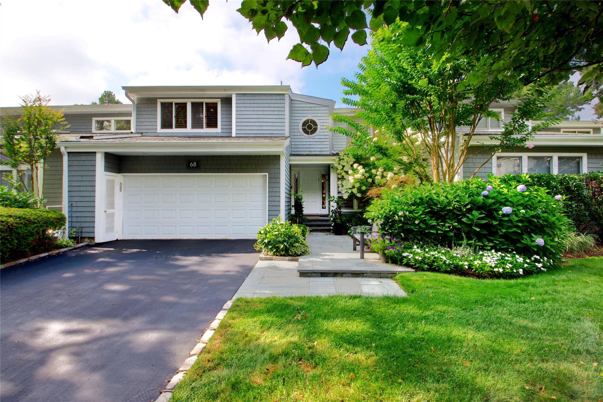 Experience elegant, turnkey living in this beautifully updated luxury condo, located in the highly sought after Spruce Pond community of North Hills.