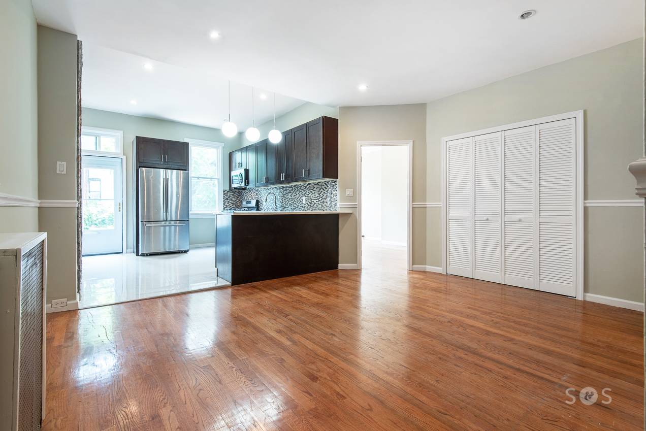 Situated in a three family home in Ridgewood, this updated floor through unit features one bedroom one bath.