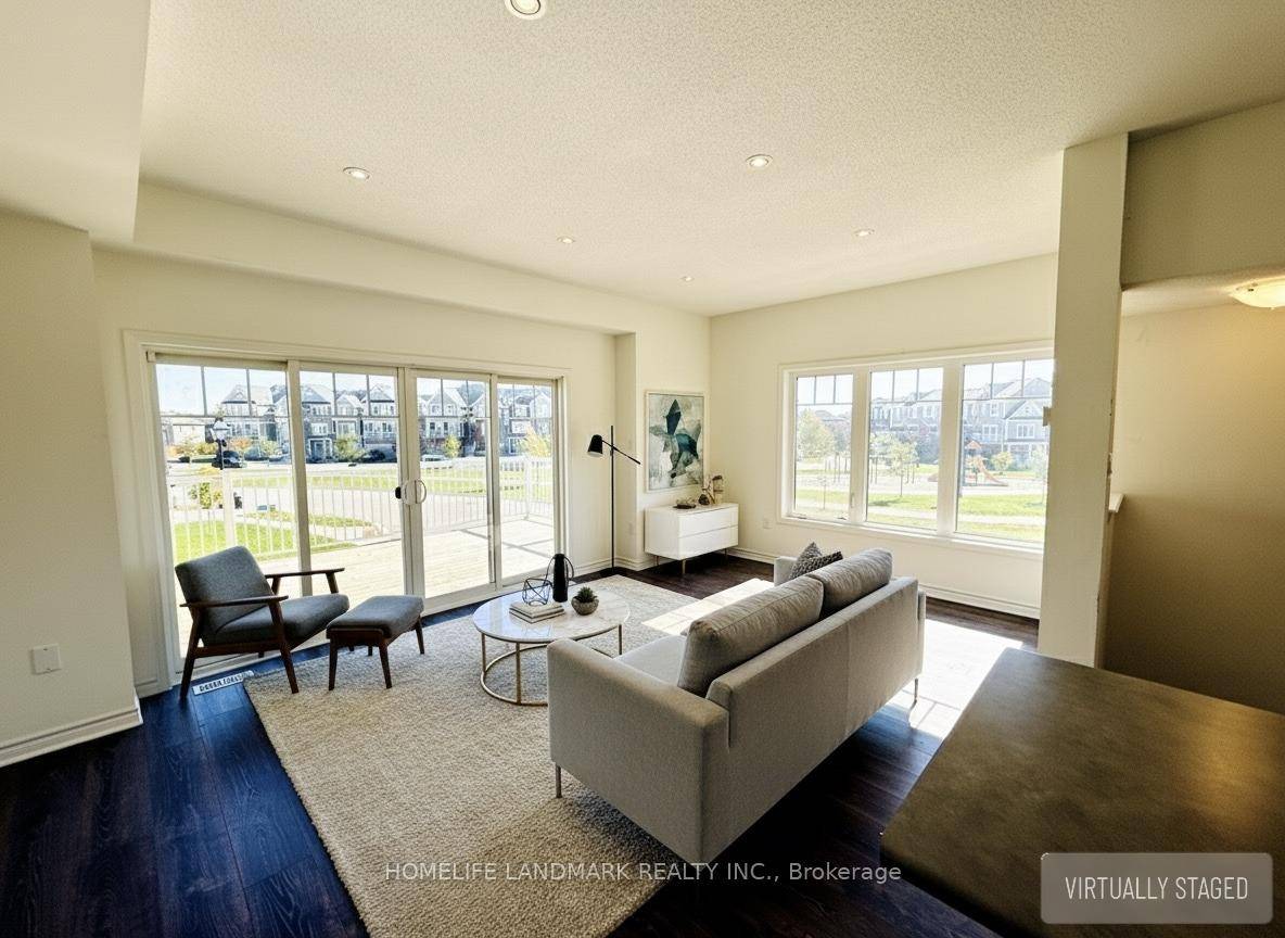 STOP LOOKING, MUST SEE ! Beautiful bright end unit FREEHOLD townhome with unobstructed views all around featuring 3 bedrooms, 3 bathrooms, overlooking greenery, nature, and golf course.