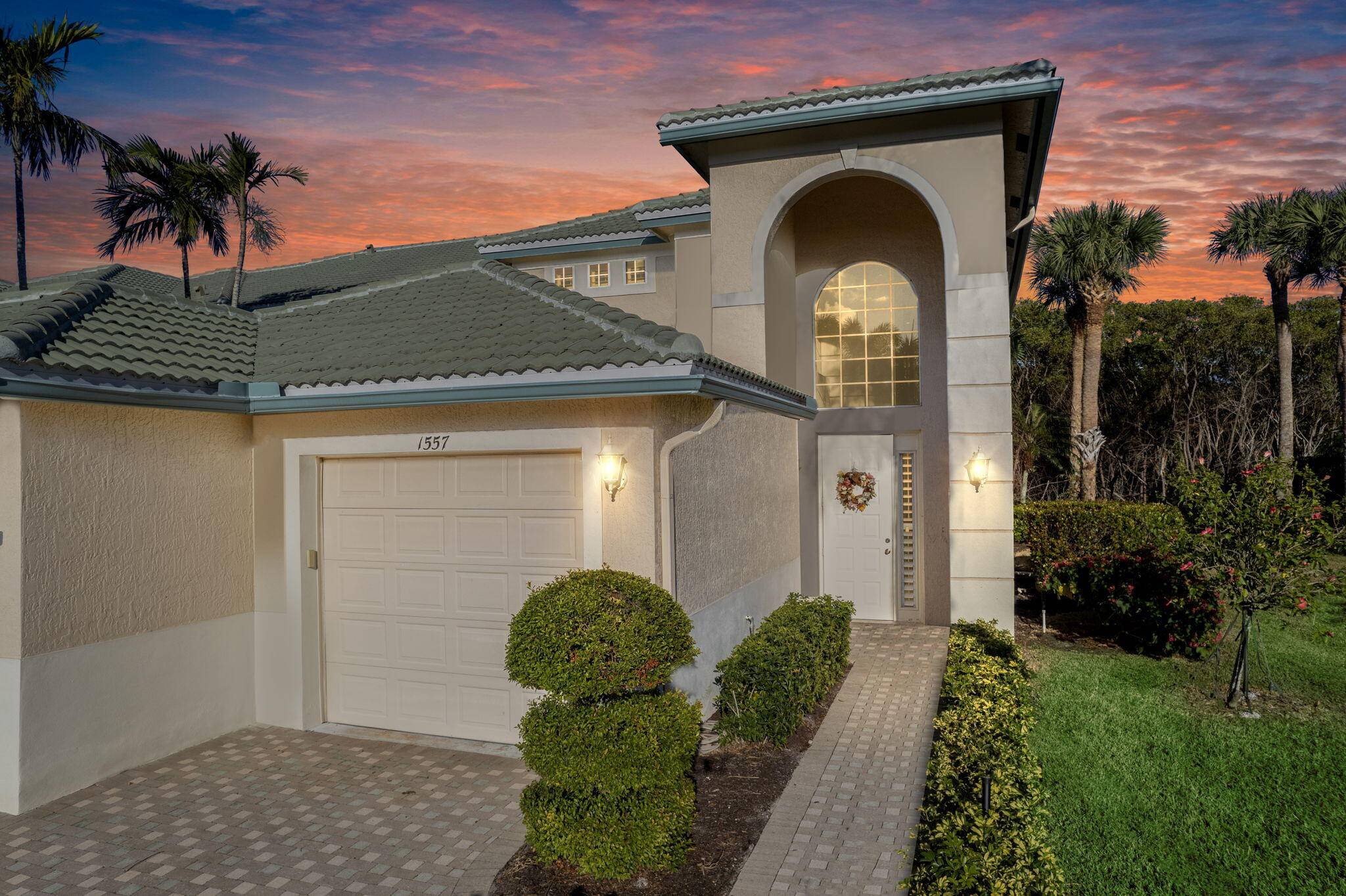Renovated second floor townhome in Ballantrae Yacht and Country Club with elevator and native preserve views.