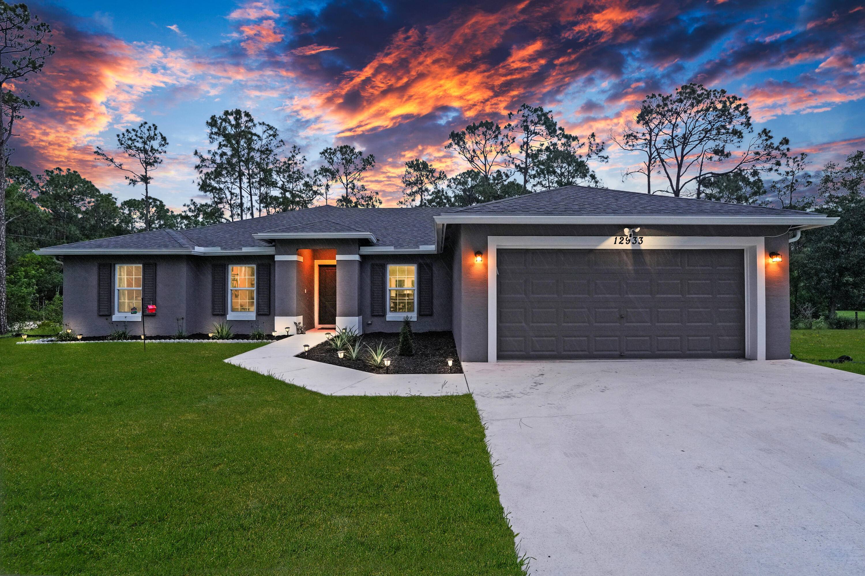 NEW CONSTRUCTION 2024 ! 4 bed PLUS OFFICE, 3 Bath CBS w Impact Glass, up to 12' ceilings, premium fixtures plank tile throughout perched high on 1.