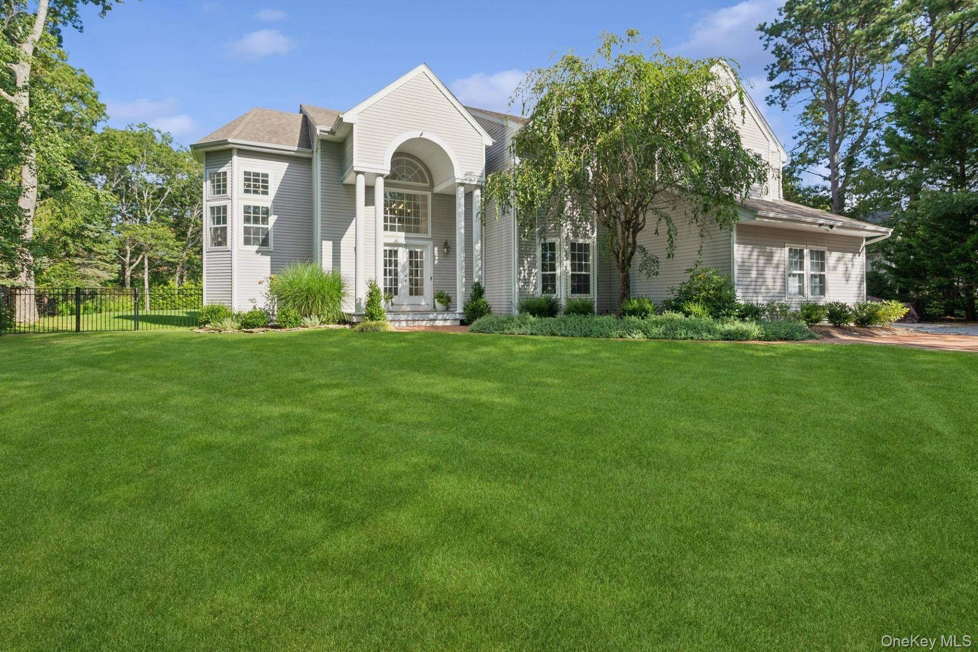 Welcome to 35 Hollow Lane, nestled in the serene Westhampton area.