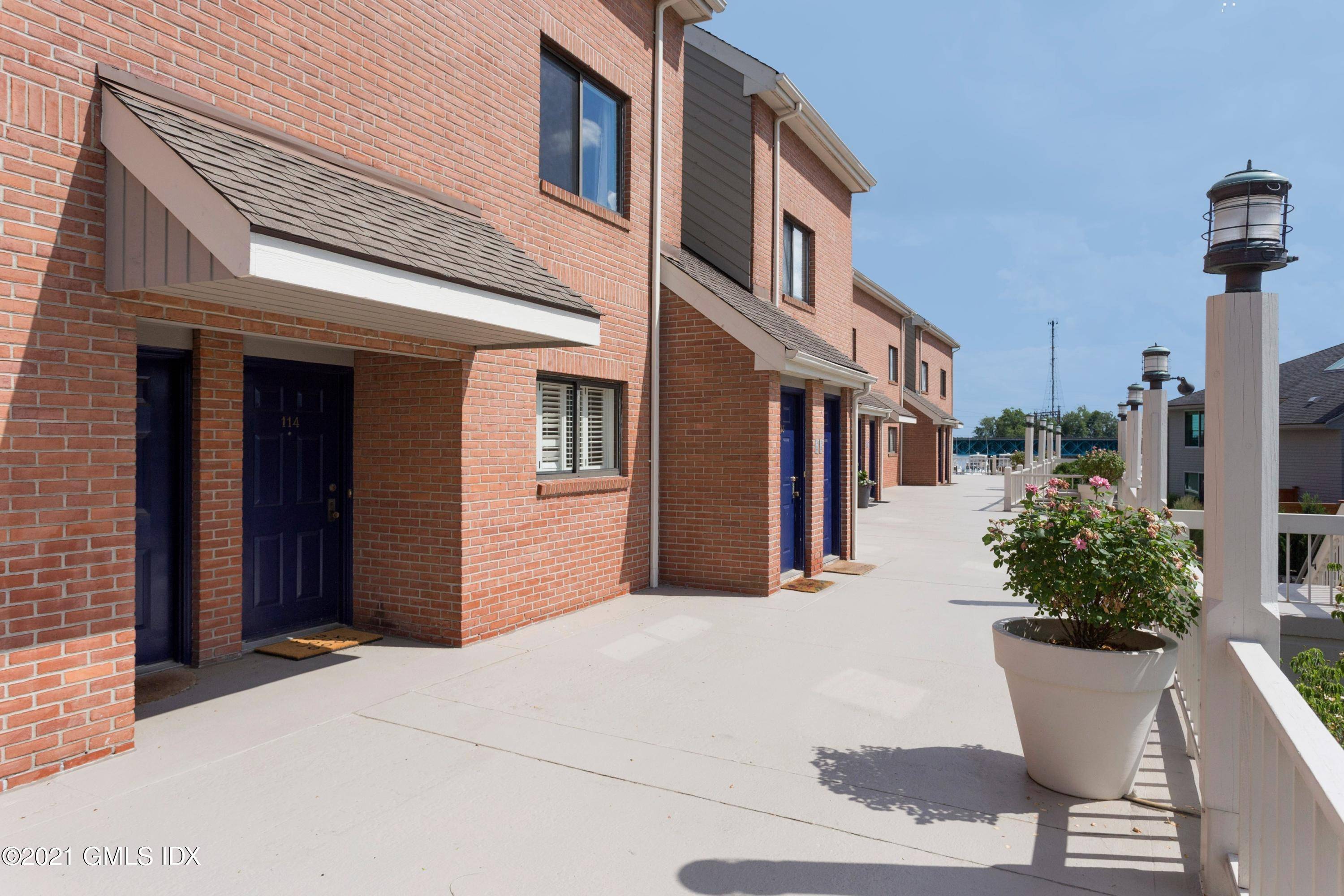 Beautifully renovated open and airy townhouse with direct water views.