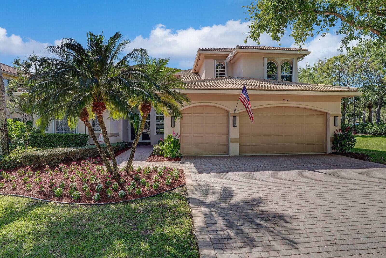 This stunning Cobalt model home in Canyon Lakes by GL Homes offers 5 spacious bedrooms, 4 full bathrooms, and a 3 car garage with breathtaking lake views.