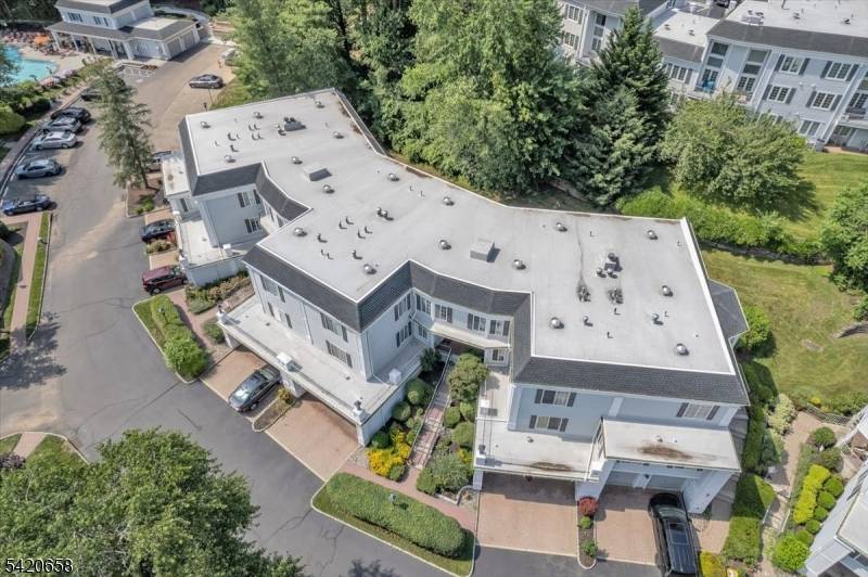 Welcome to this beautifully maintained 2 bedroom, 1 bath townhouse in Sutton woods, a highly desirable community in Chatham, NJ.