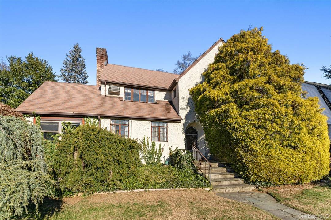 Brimming with character and opportunity, this 1928 Tudor residence is being sold As Is and is ready for a buyer with vision to make it shine.