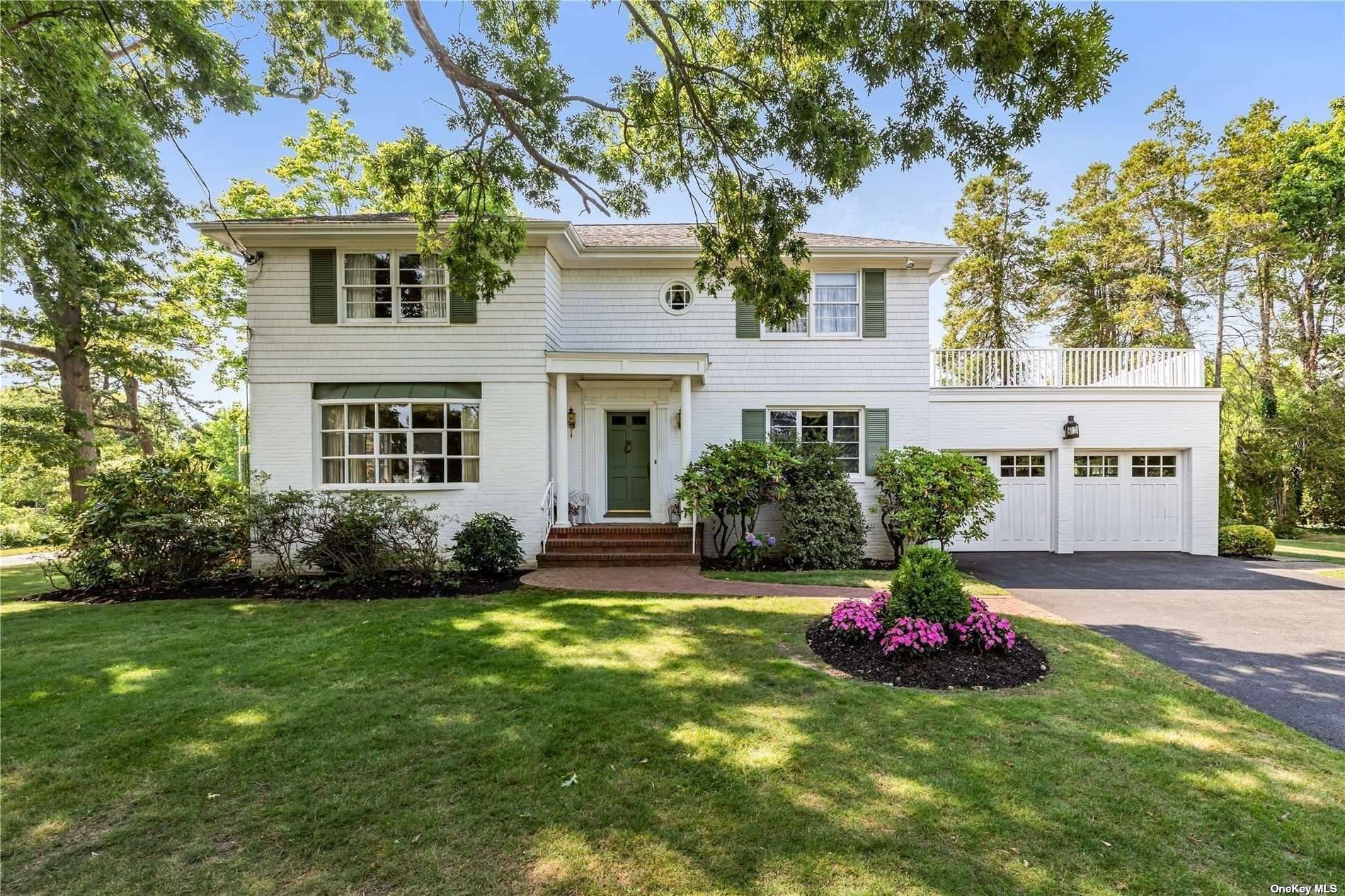 Gorgeous Brick Colonial over Looking the picturesque Brightwaters lakes.