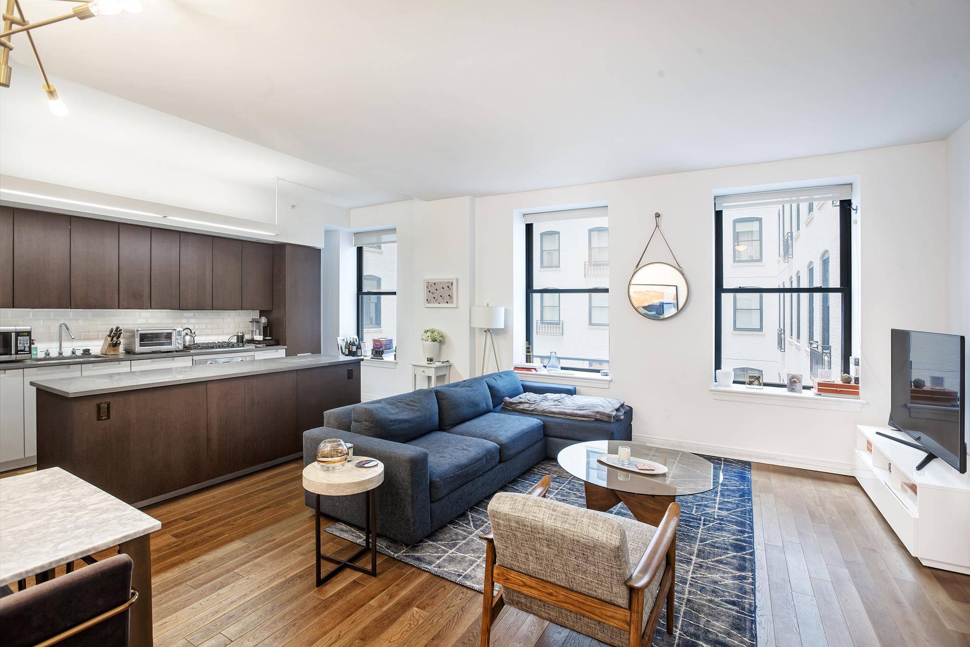 Situated on Madison Square Park in Flatiron this XXX mint stunning Fifth Avenue home has been meticulously renovated with incredible attention to detail.