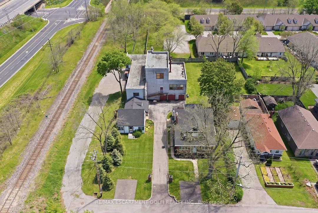 Rare opportunity to acquire a unique multi property offering in the heart of Grimsby, consisting of 50 52 and 54 Park Road North, being sold together.