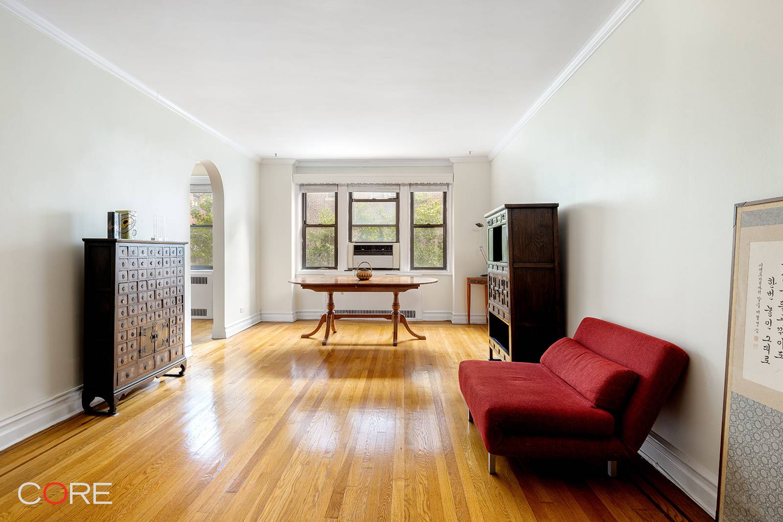 With its garden home charm, this lovingly kept and updated corner home is nestled amidst one of the most celebrated and picturesque Jackson Heights gardens.