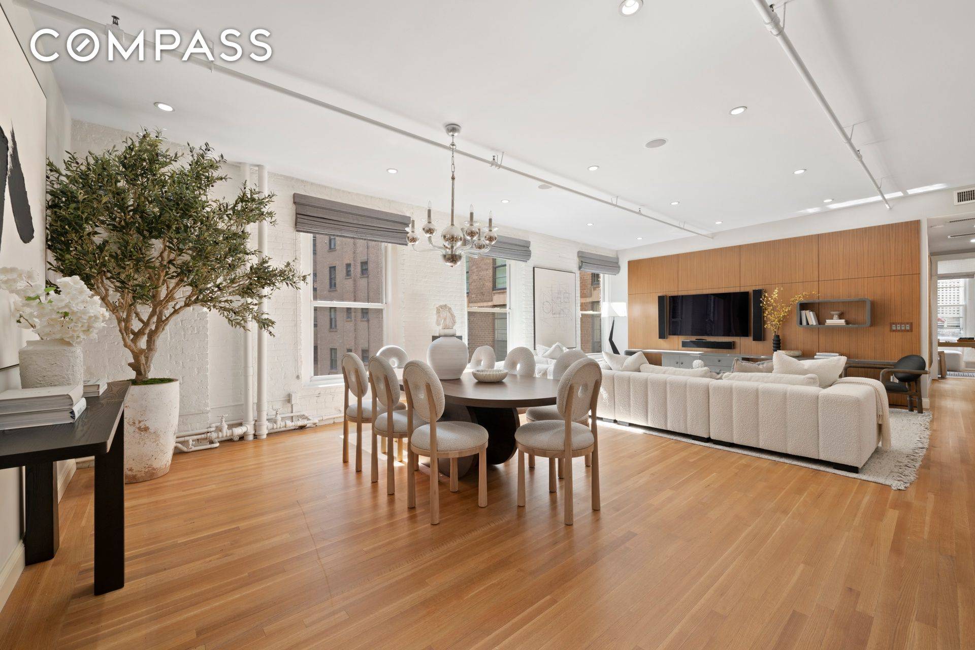 Experience refined living in this stunning 4 bedroom loft, masterfully renovated to offer 2, 100 sq.