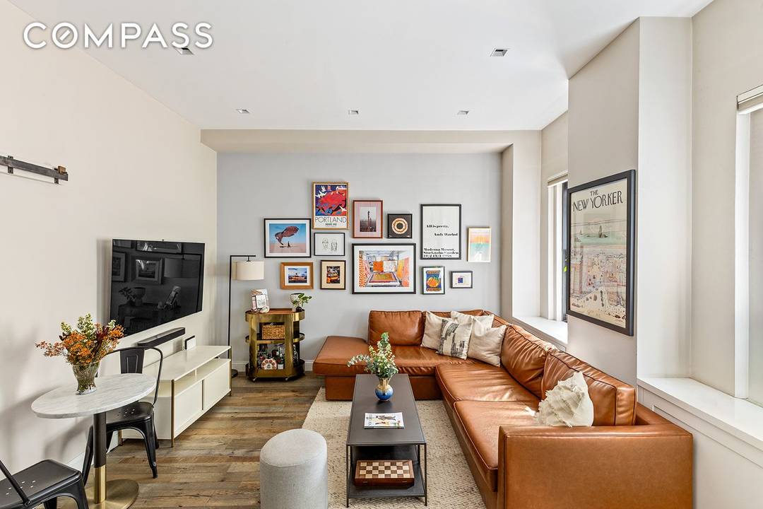 This beautifully reimagined one bedroom residence blends pre war charm with modern luxury in one of downtown s most coveted locations.